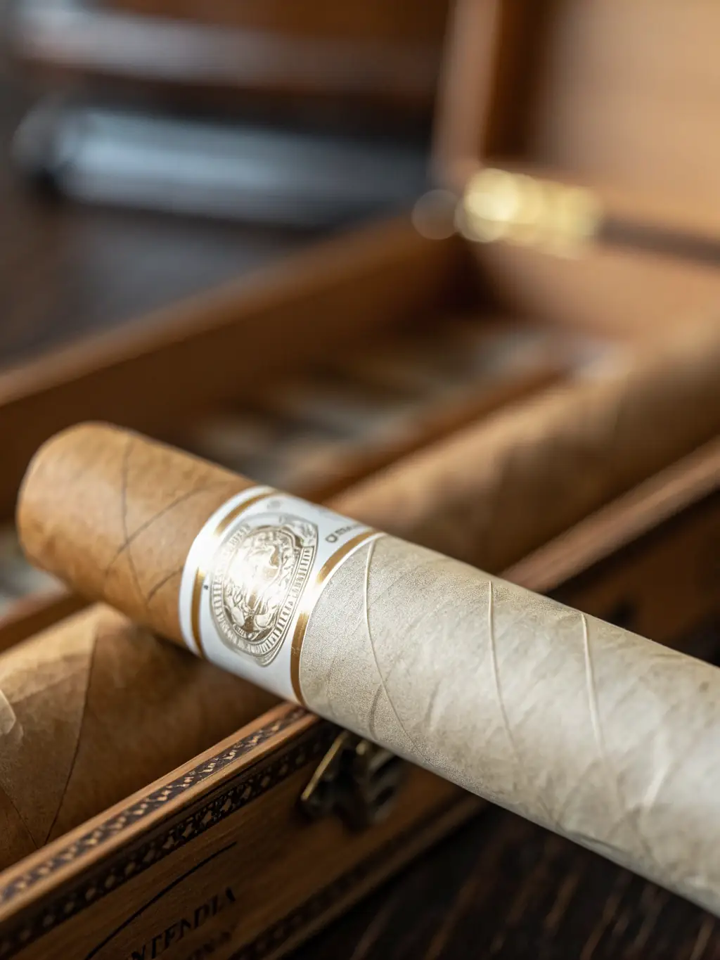 A light-colored Connecticut Shade cigar, emphasizing its delicate wrapper and smooth appearance.